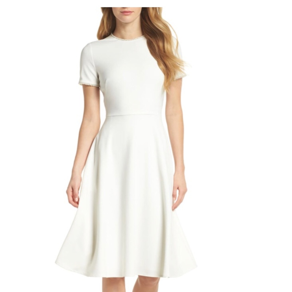 White, pearl lined dress